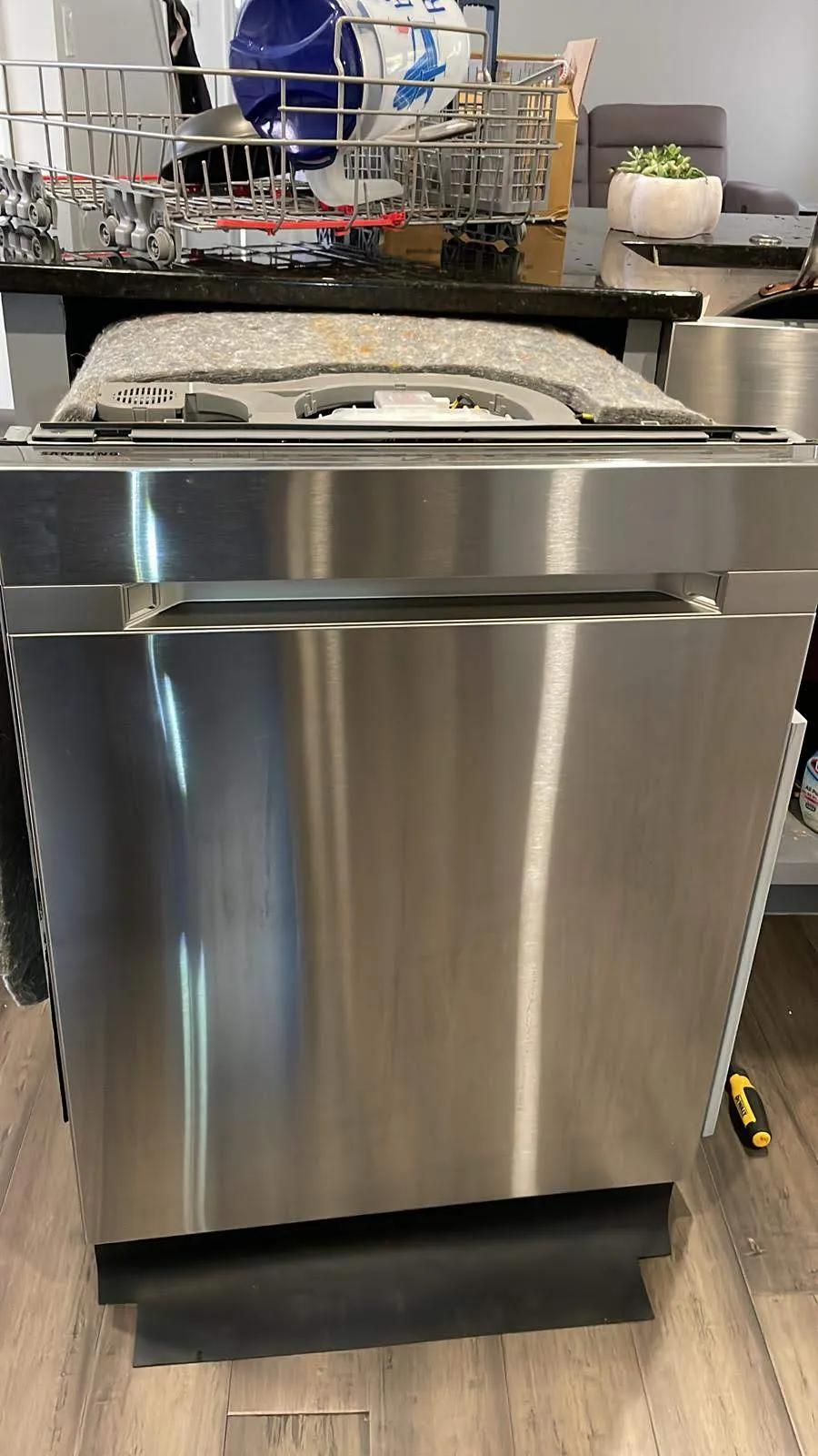 Dishwasher pulled out for repair