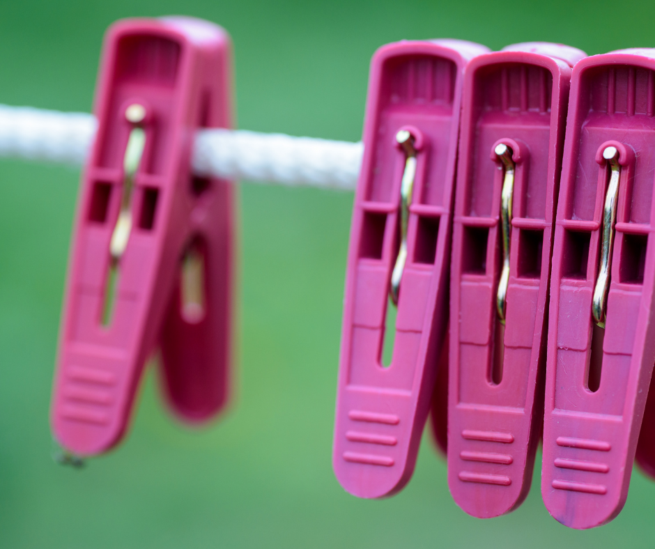 Washing Delicates Photo of a clothes line with pink clips
