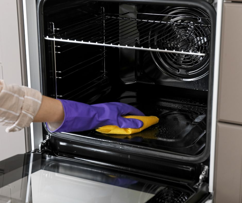 Nice and cleaned self-cleaning oven on final wipe down.