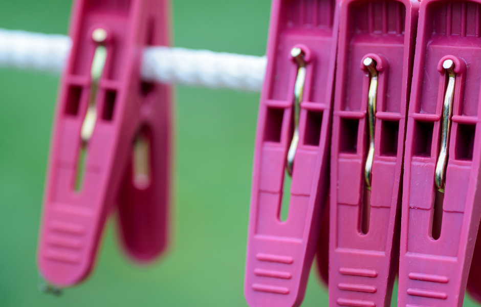 Washing Delicates Photo of a clothes line with pink clips
